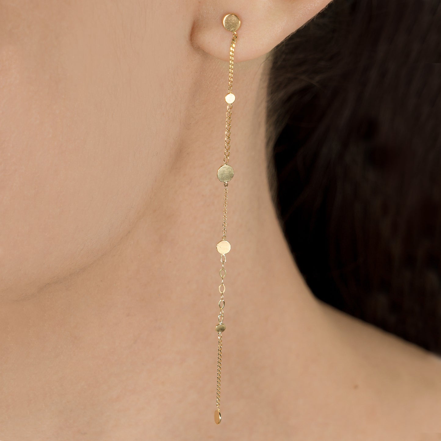 Sweet Pea 18ct gold Ancient World long chain and disc earrings on model