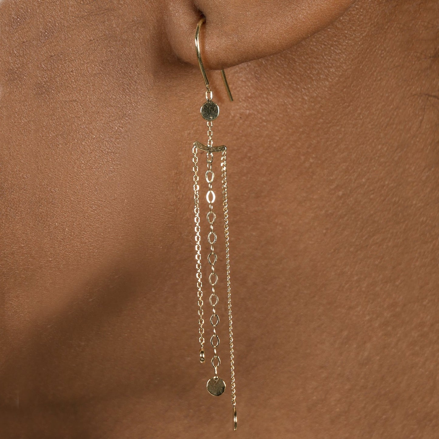 Sweet Pea 18ct yellow gold Ancient World hook and chain and disc earrings on model