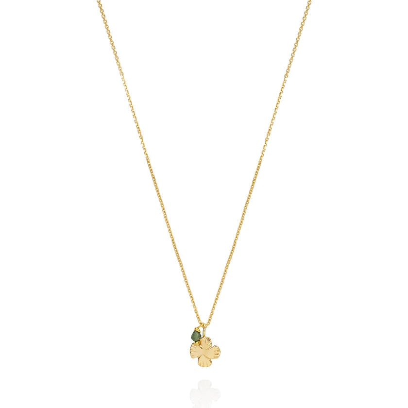 Laura Lee's 9ct gold Wildflower necklace features a 6mm small flower charm and green tourmaline
