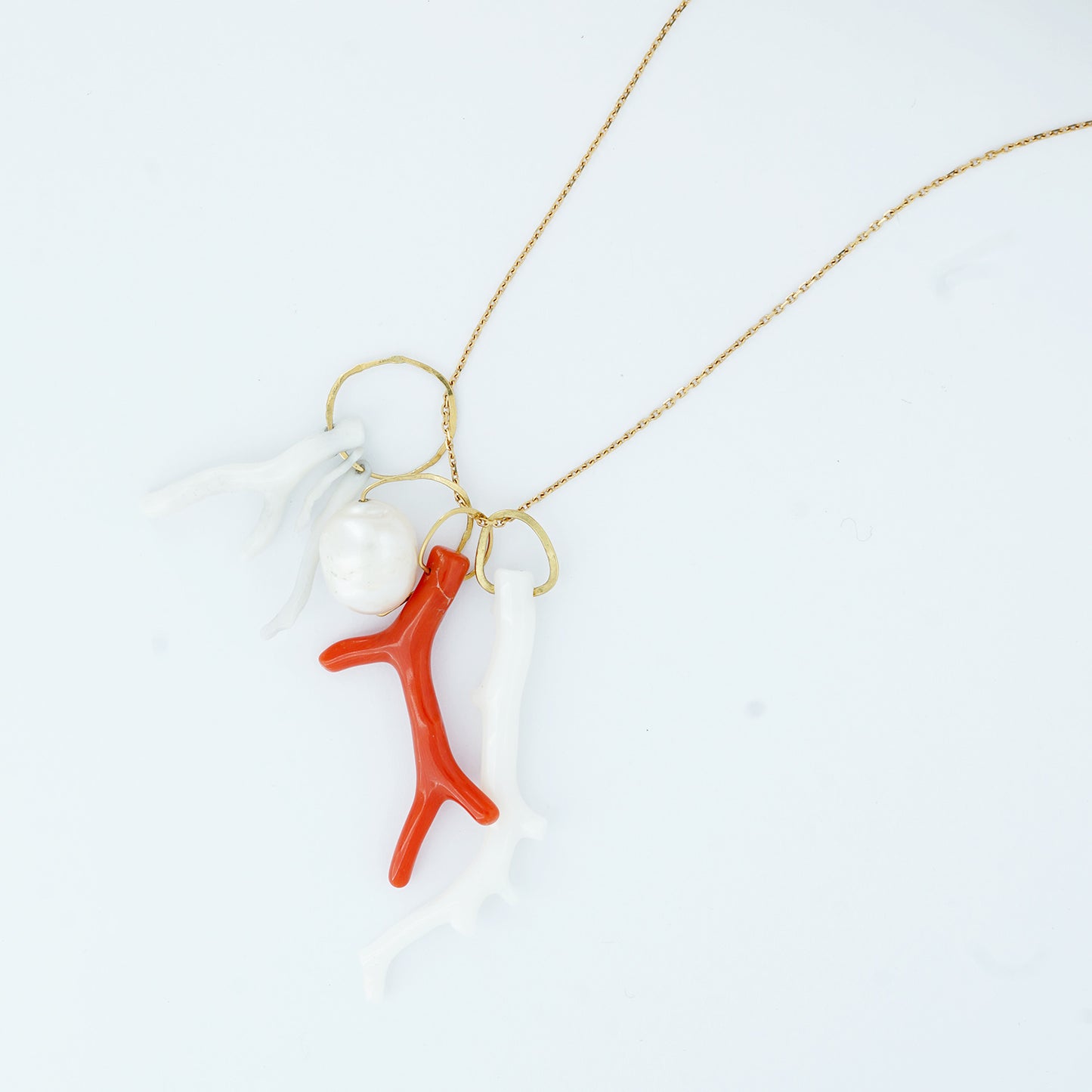 Sweet Pea 18ct gold necklace with pearl and coral branch charms