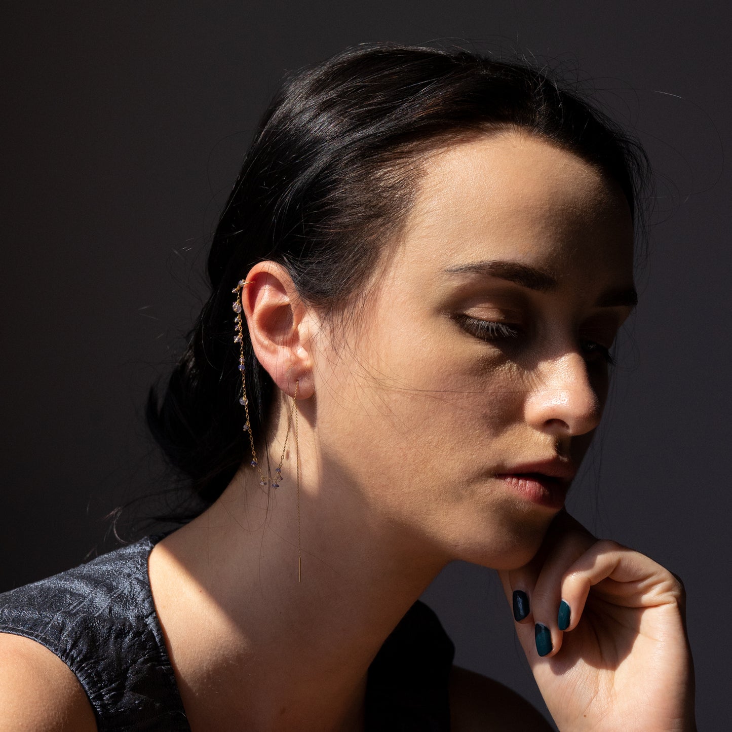 18ct yellow gold thread though earring with chain to ear cuff and tanzanite and amethyst beads on model