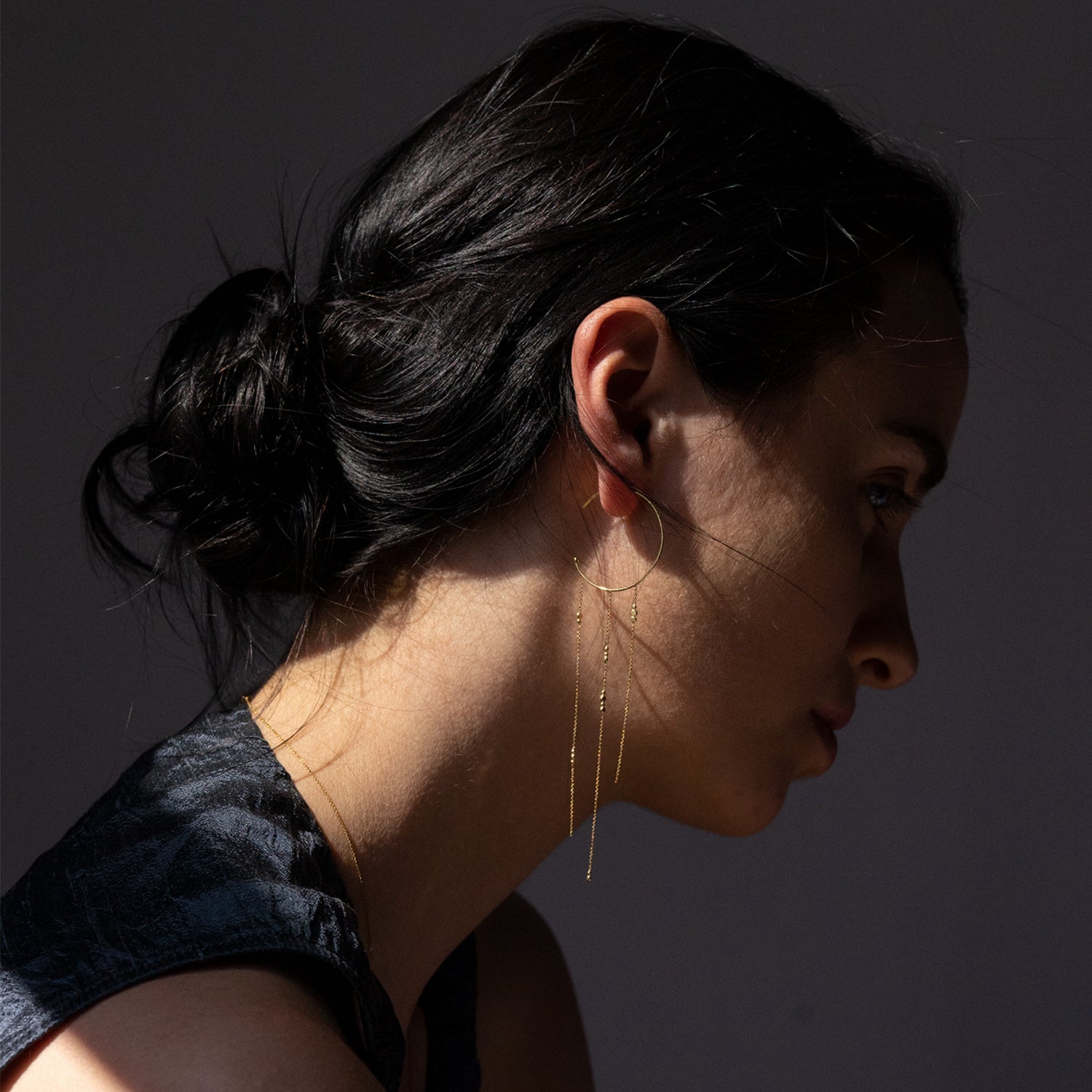 18ct yellow gold hoop earrings with 3 strands of fine chain with Bits and Bobs on model