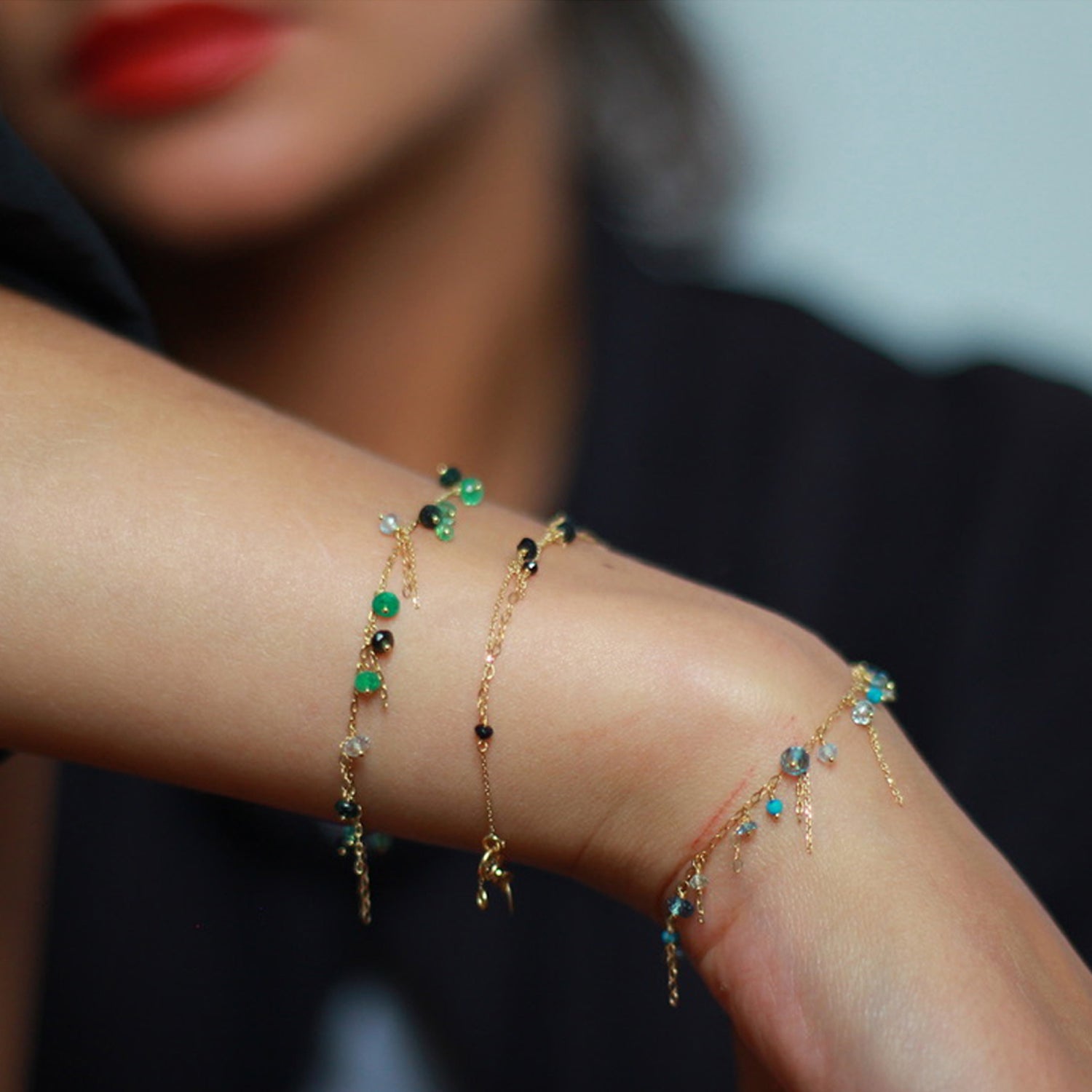 18ct yellow gold chain beaded bracelet with Emerald beads on model