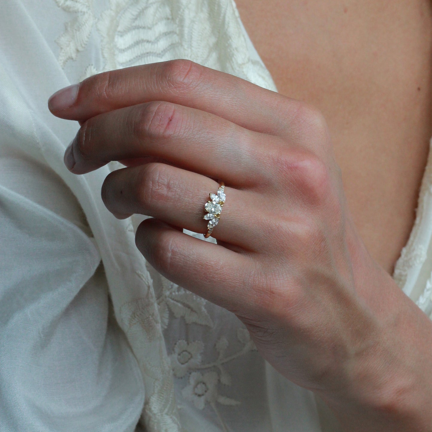 Sweet Pea 18ct yellow gold Tiara engagement ring with oval diamond and 2 marquise diamonds either side and diamonds set in the band.