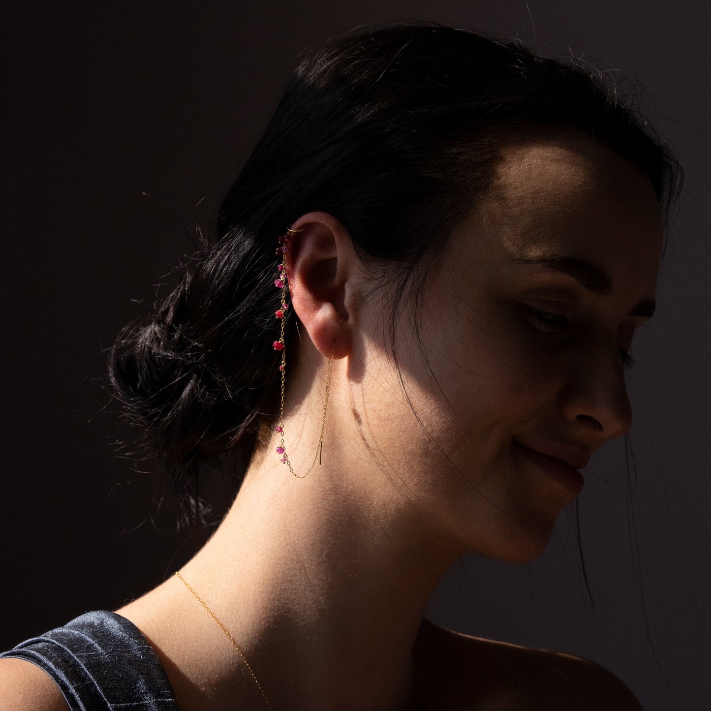 18 ct yellow gold thread though earring with chain to ear cuff and Ruby beads on model