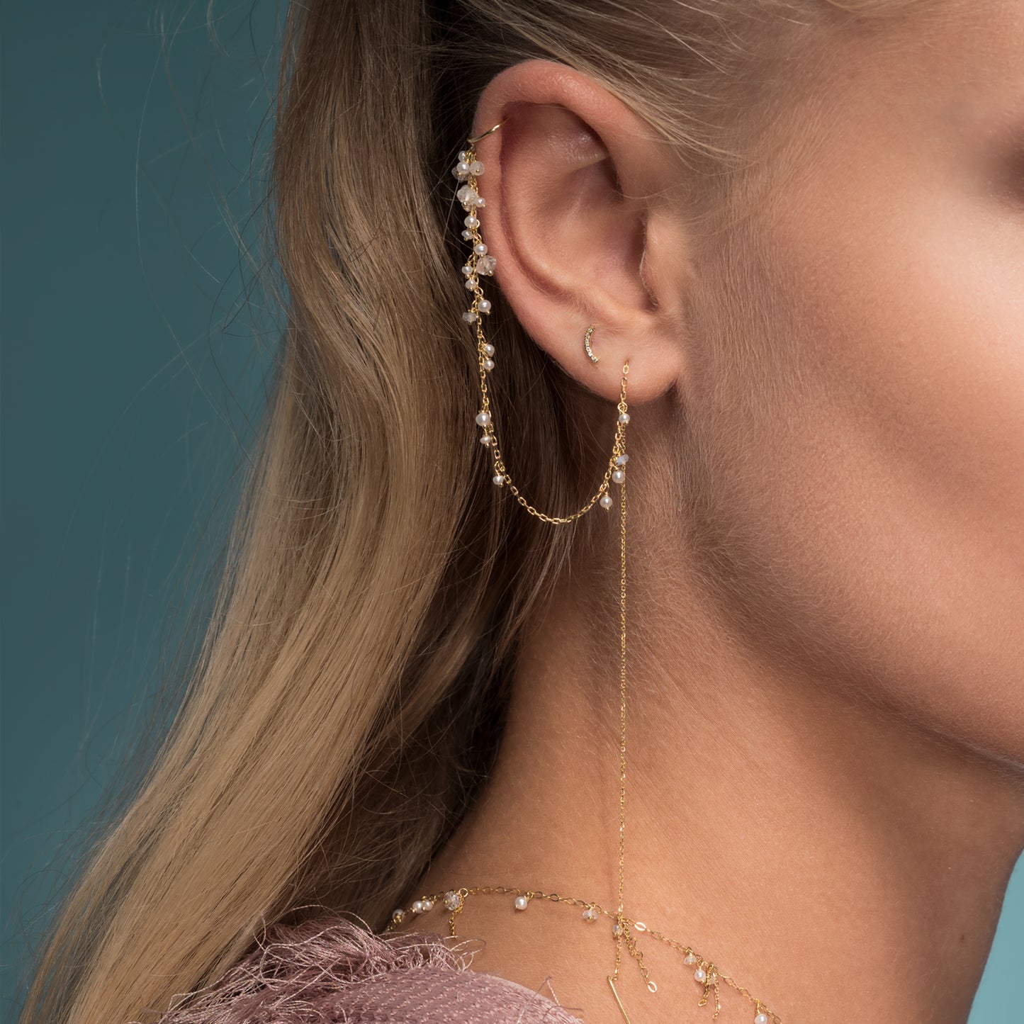 18ct yellow thread through long chain earring with ear cuff with seed Pearl and Moonstone on model