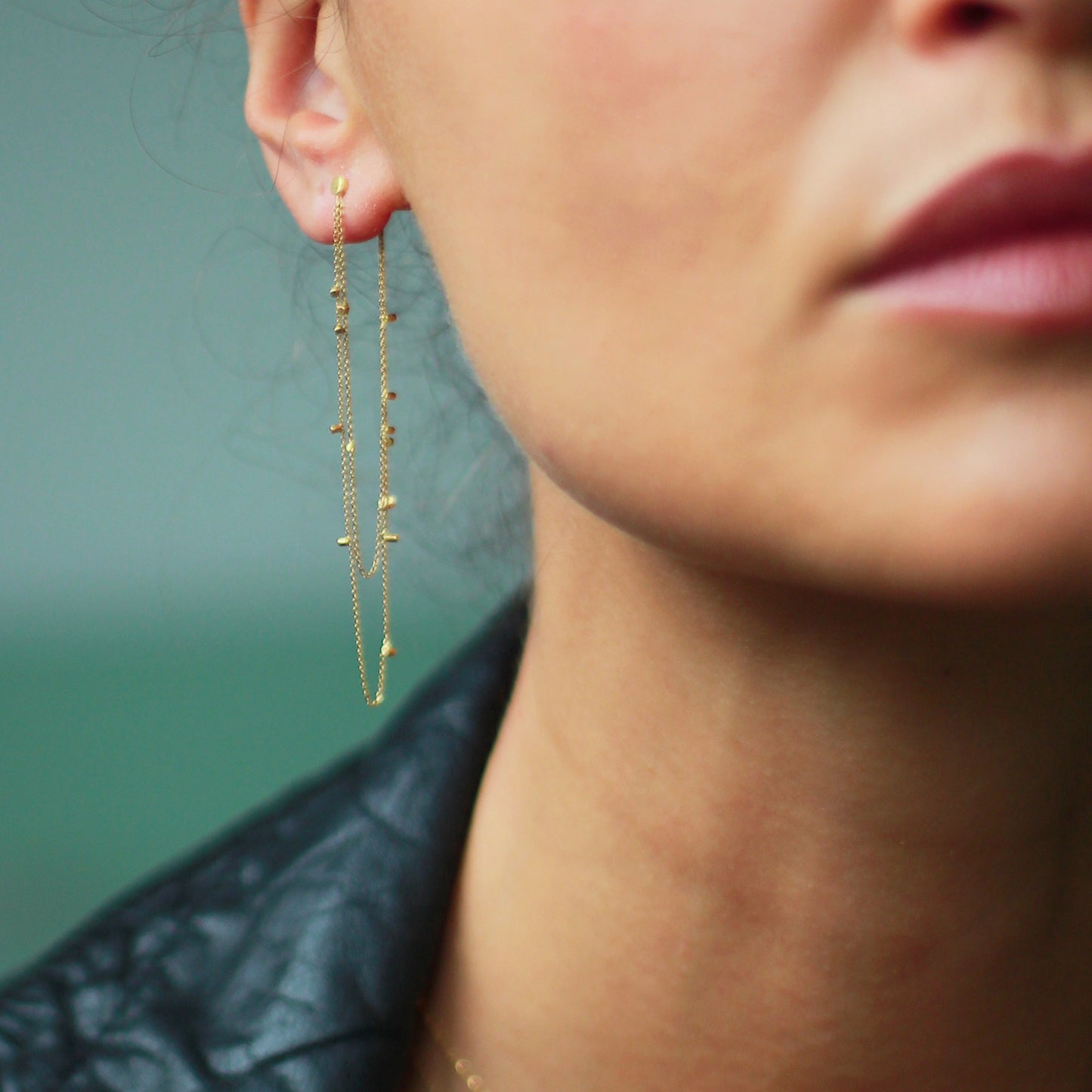 Long Double Drape Gold Dust Studs on model