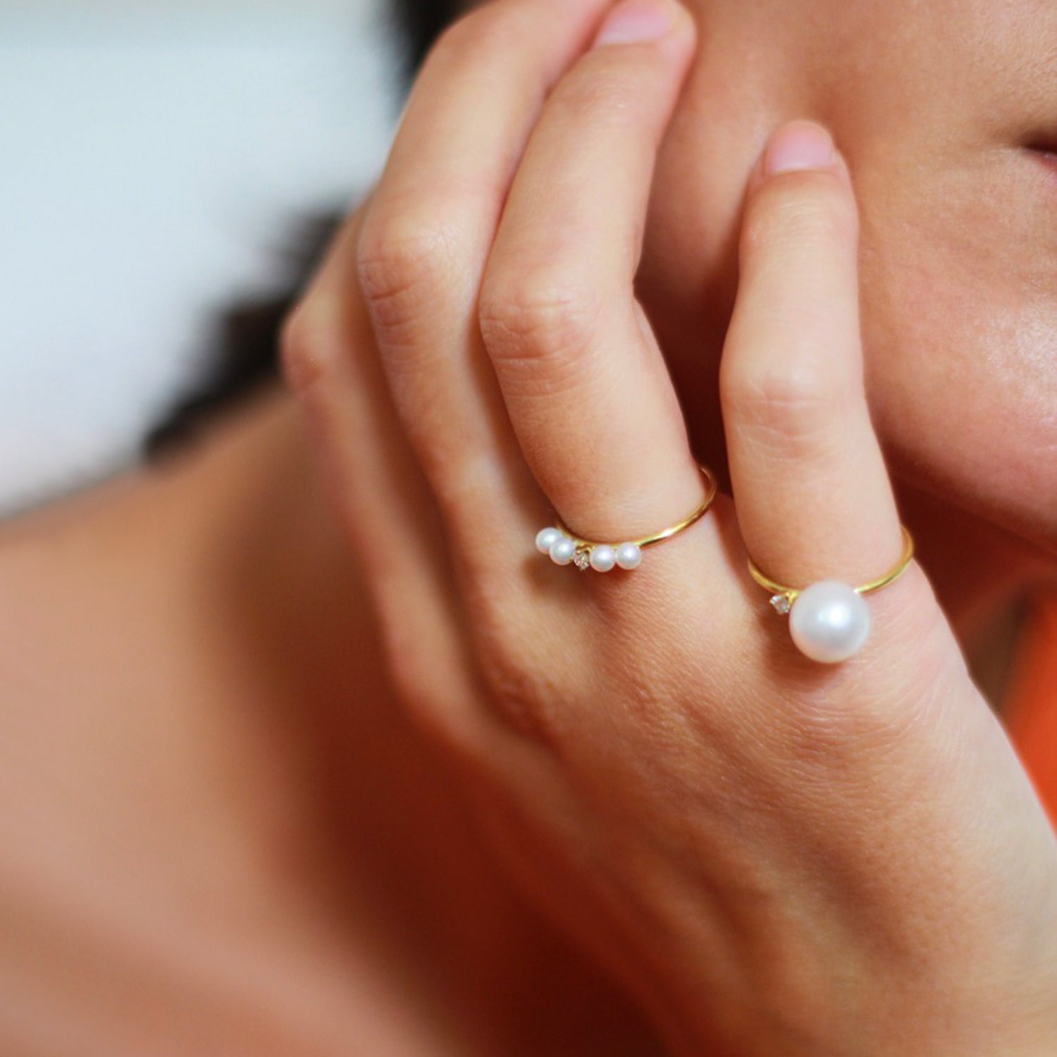 Diamond and Four Pearl Ring 18ct yellow gold ring with 4 pearls and a diamond  on model
