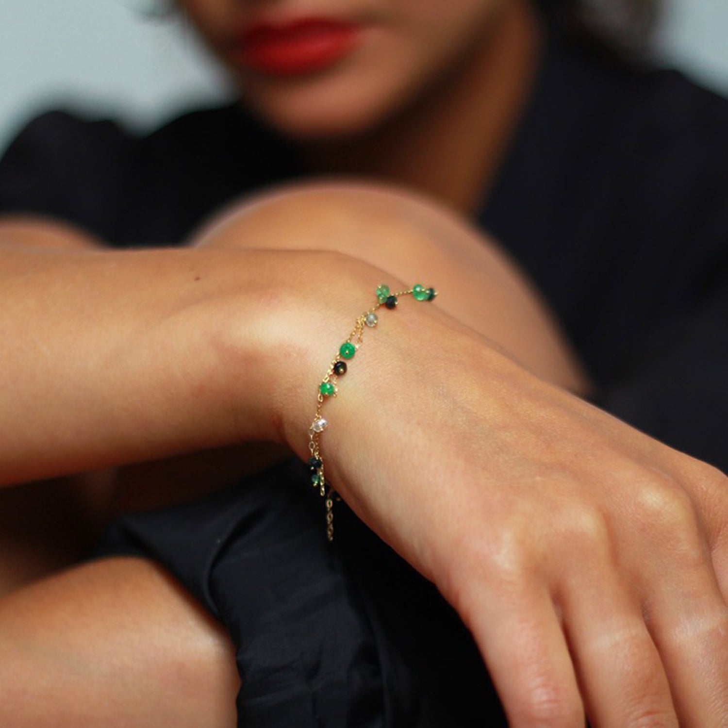 18ct yellow gold chain beaded bracelet with Emerald beads on model