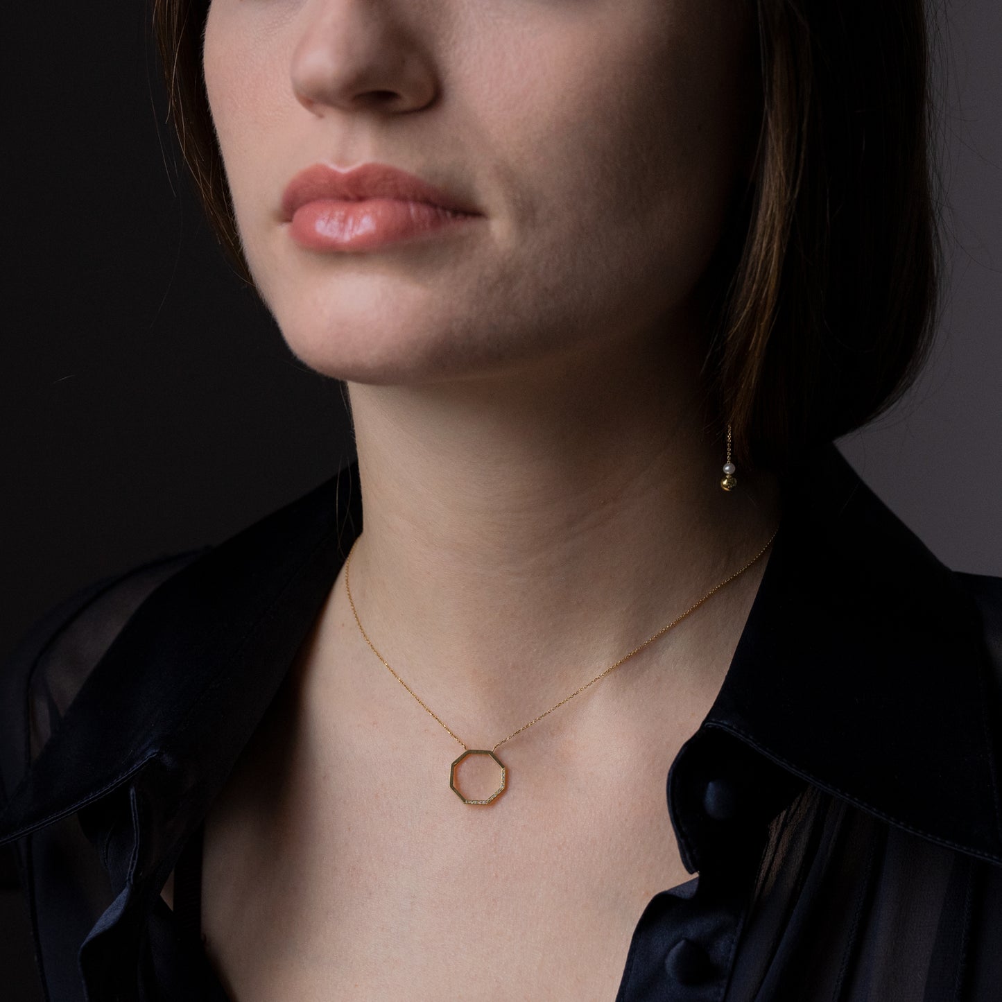 18ct yellow gold octagon necklace pave set with 15 diamonds on model