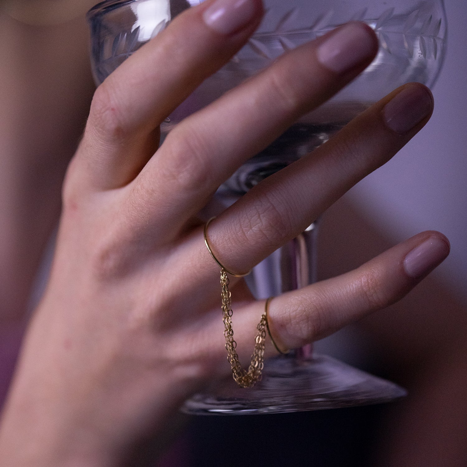 18ct yellow gold double ring with layered connecting chains  on model
