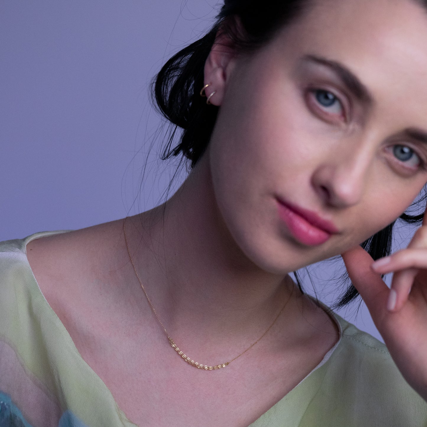 18ct yellow gold necklace with layered chain section on model