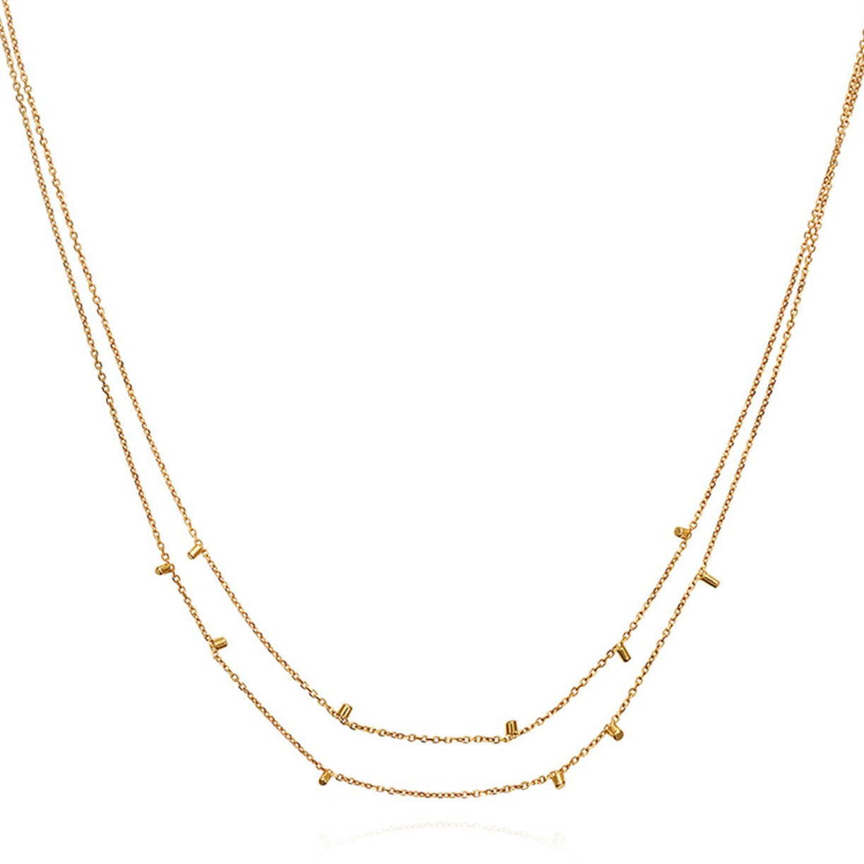 This cute 18 ct yellow double strand necklace is made of fine chain sprinkled with a shimmering of gold embellishments and is part of our Gold Dust Collection.