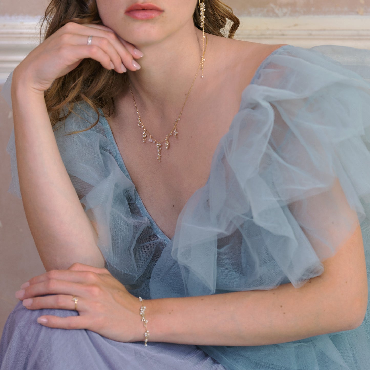 18ct Gold Goddess of Love necklace with clusters of Pearl and Crystal beads/drops on model