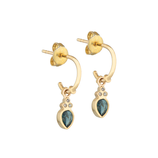 Celine Daoust 14 ct yellow gold hoops with tear charm set with pear cut sage green tourmaline and three small diamonds.