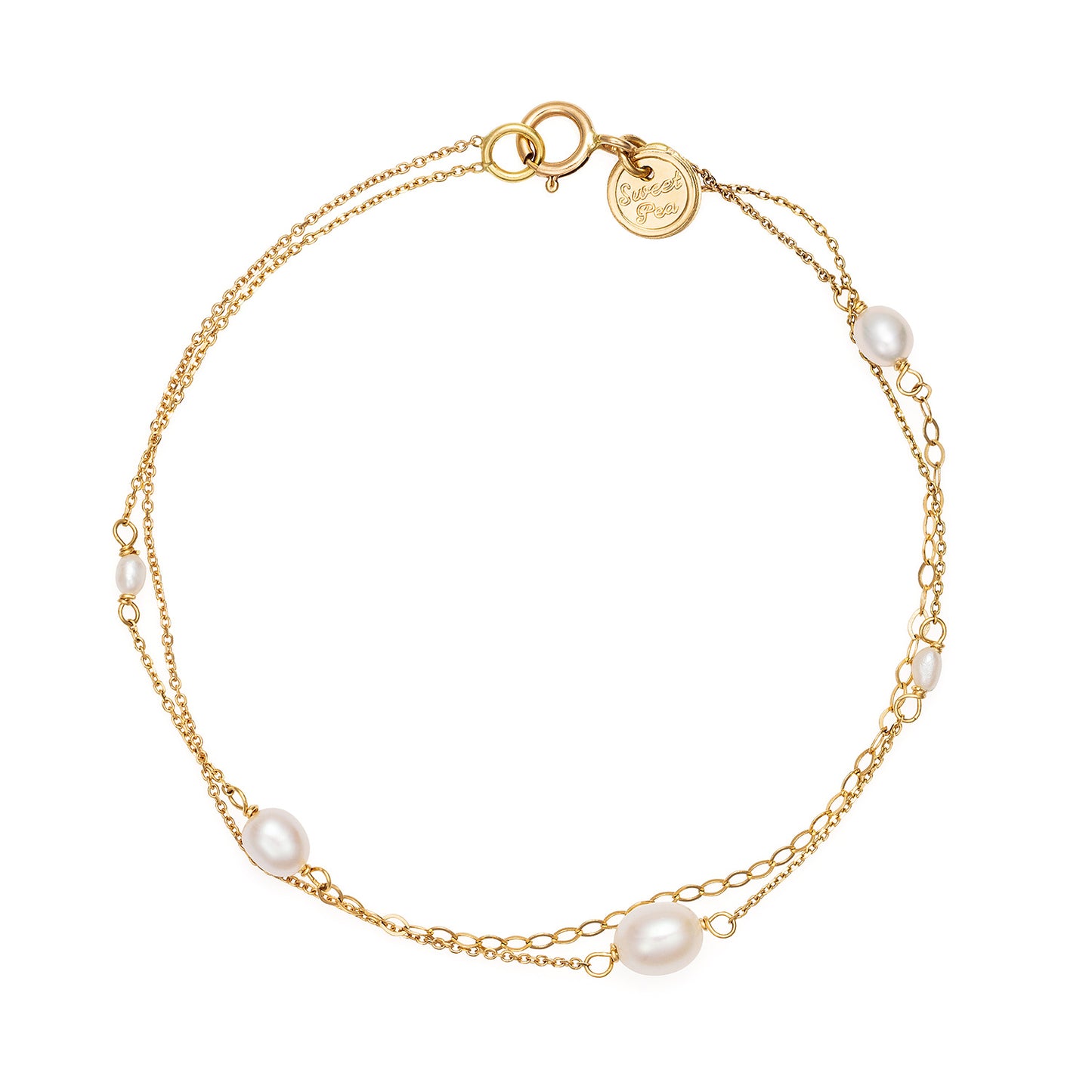 18ct Yellow Gold double strand bracelet with white oval shaped fresh water pearls and mixed fine chain detail. From our Snowdrop Pearl collection.