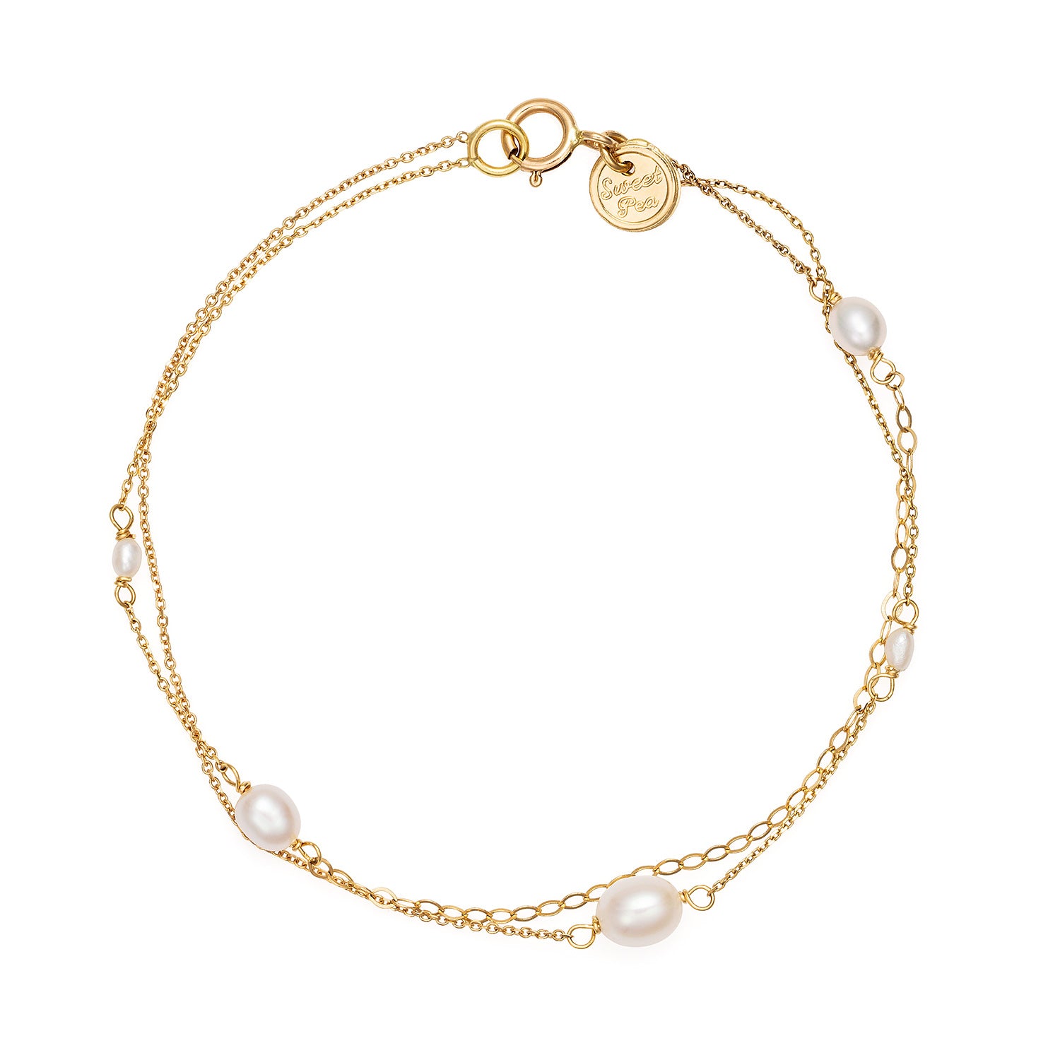 18ct Yellow Gold double strand bracelet with white oval shaped fresh water pearls and mixed fine chain detail. From our Snowdrop Pearl collection.