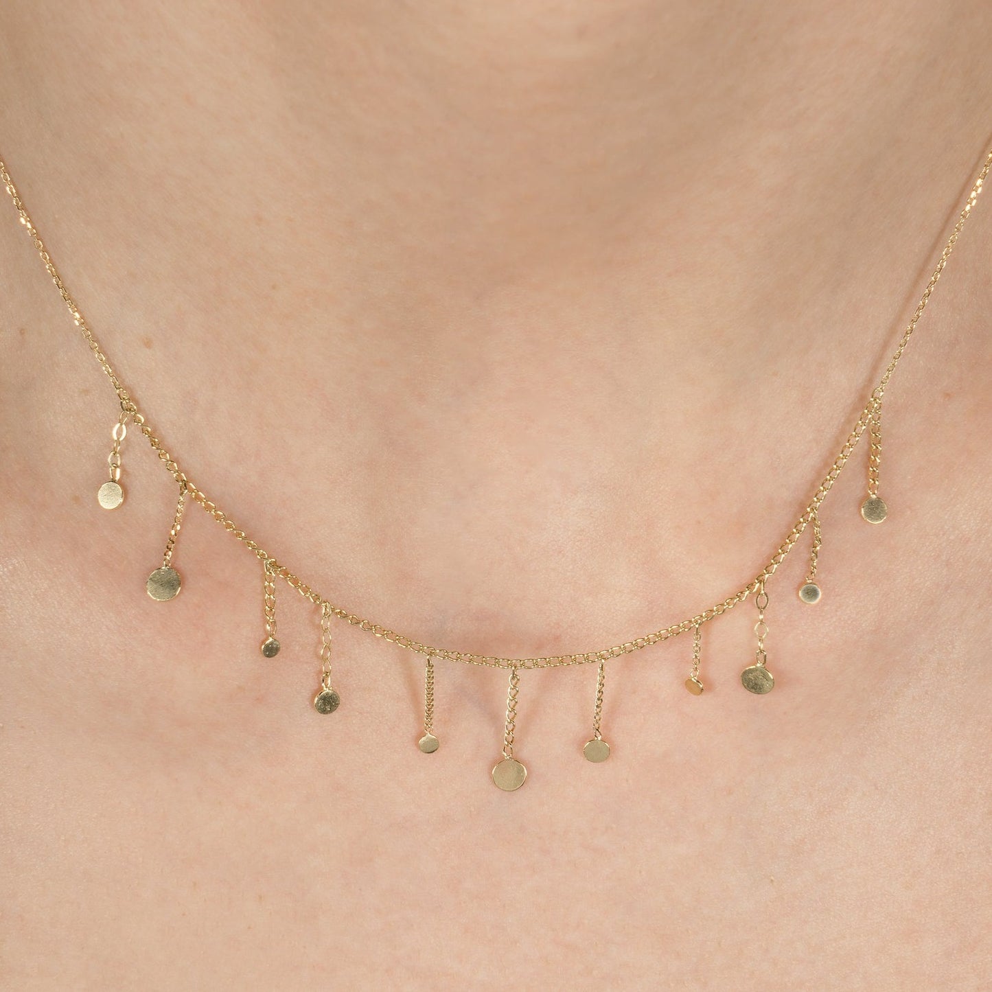 Sweet Pea 18ct gold Ancient World chain necklace with chain and disc drops on model