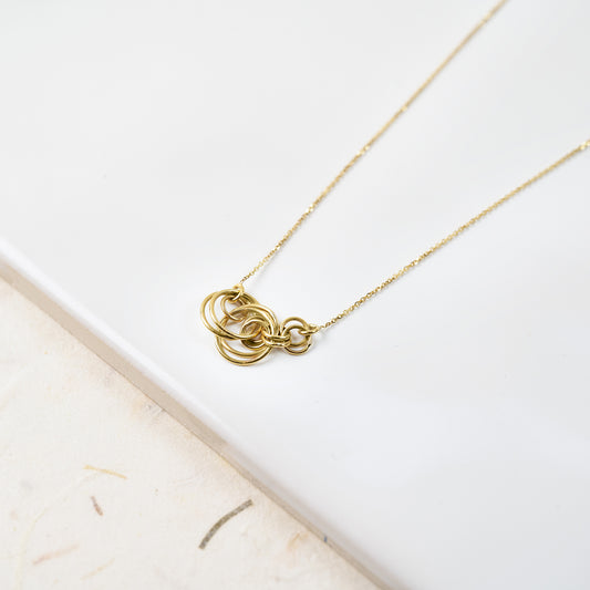 18ct yellow gold Bubble necklace with cluster of interlinked chunky circles.