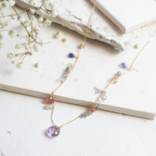 18ct yellow gold necklace from our Magic Carpet collection with ametrine, sunstone and iolite drops and a mix of precious beads. 