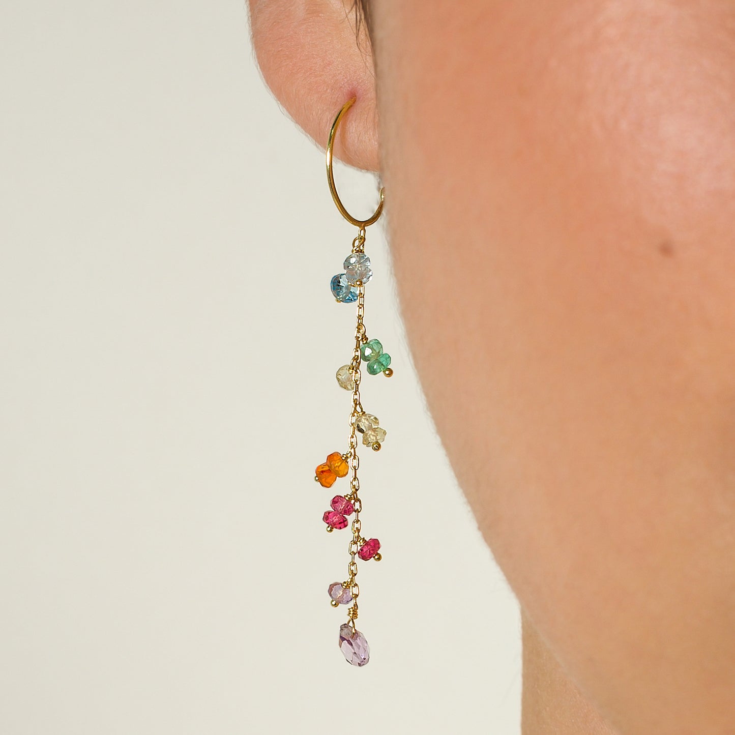 Sweet Pea 18ct gold Love is Love Hanging Chain Baby Hoop rainbow Earrings on model
