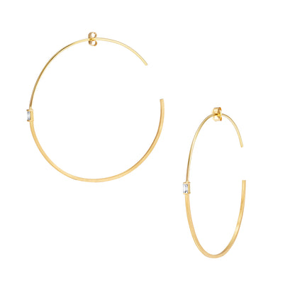 18ct Gold medium half/half hoop earrings with baguette Diamonds.