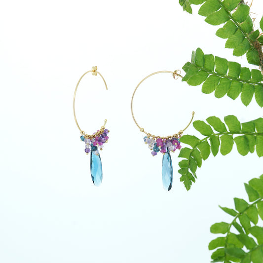 18ct yellow gold chain hoops with large London blue topaz drops and a beaded mix of London blue topaz, amethyst, pink Amethyst and hot pink sapphire, from our Roses & Violets collection.