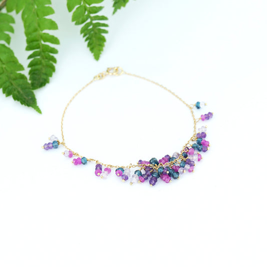 18ct yellow gold chain beaded bracelet with London blue topaz, amethyst, pink Amethyst and hot pink sapphire, from our Roses & Violets collection.