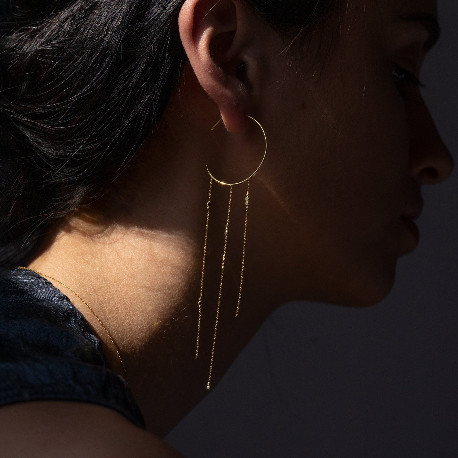 18ct yellow gold hoop earrings with 3 strands of fine chain with Bits and Bobs on model