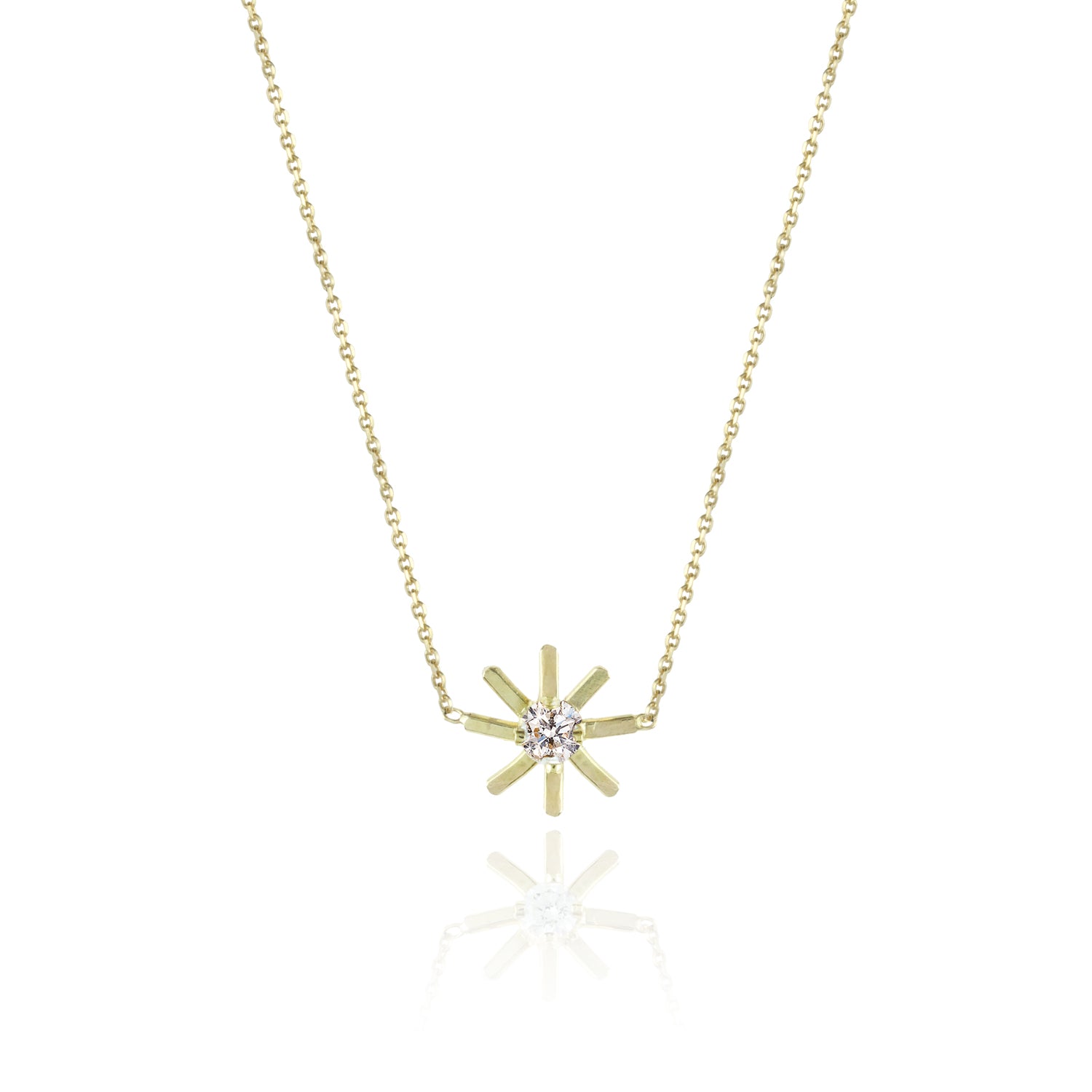 These 18ct yellow gold fine chain necklace is from our Pop Up Daisy Collection. The Flower motif is made up from fine gold petals and features a central Diamond set collet.