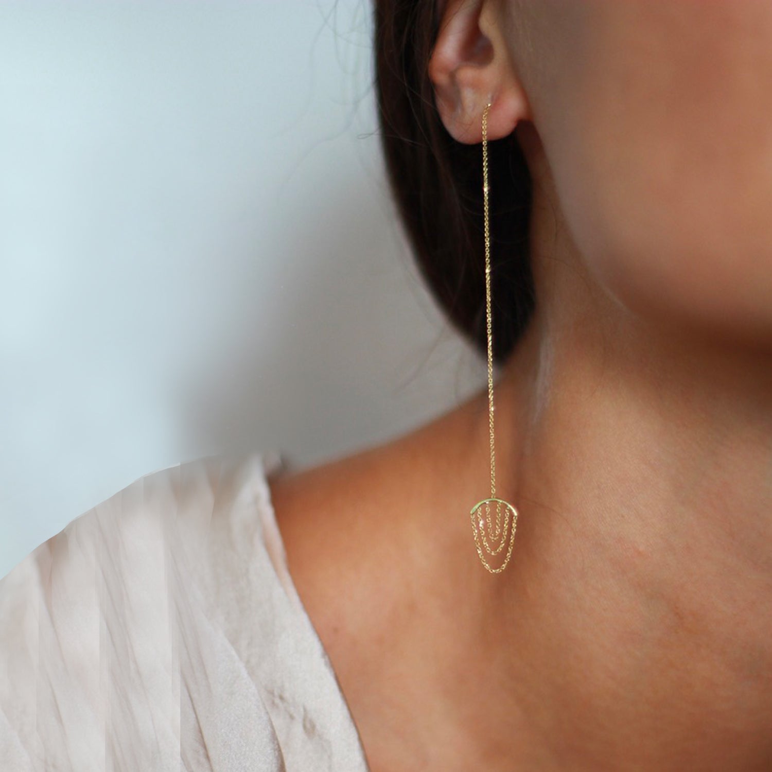 Sweet Pea 18ct yellow gold Nouveau Now thread through earrings with looped chains on model.