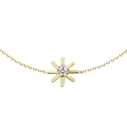 This 18ct yellow gold fine chain bracelet is from our Pop Up Daisy Collection. The Flower motif is made up from fine gold petals and features a central Diamond set collet