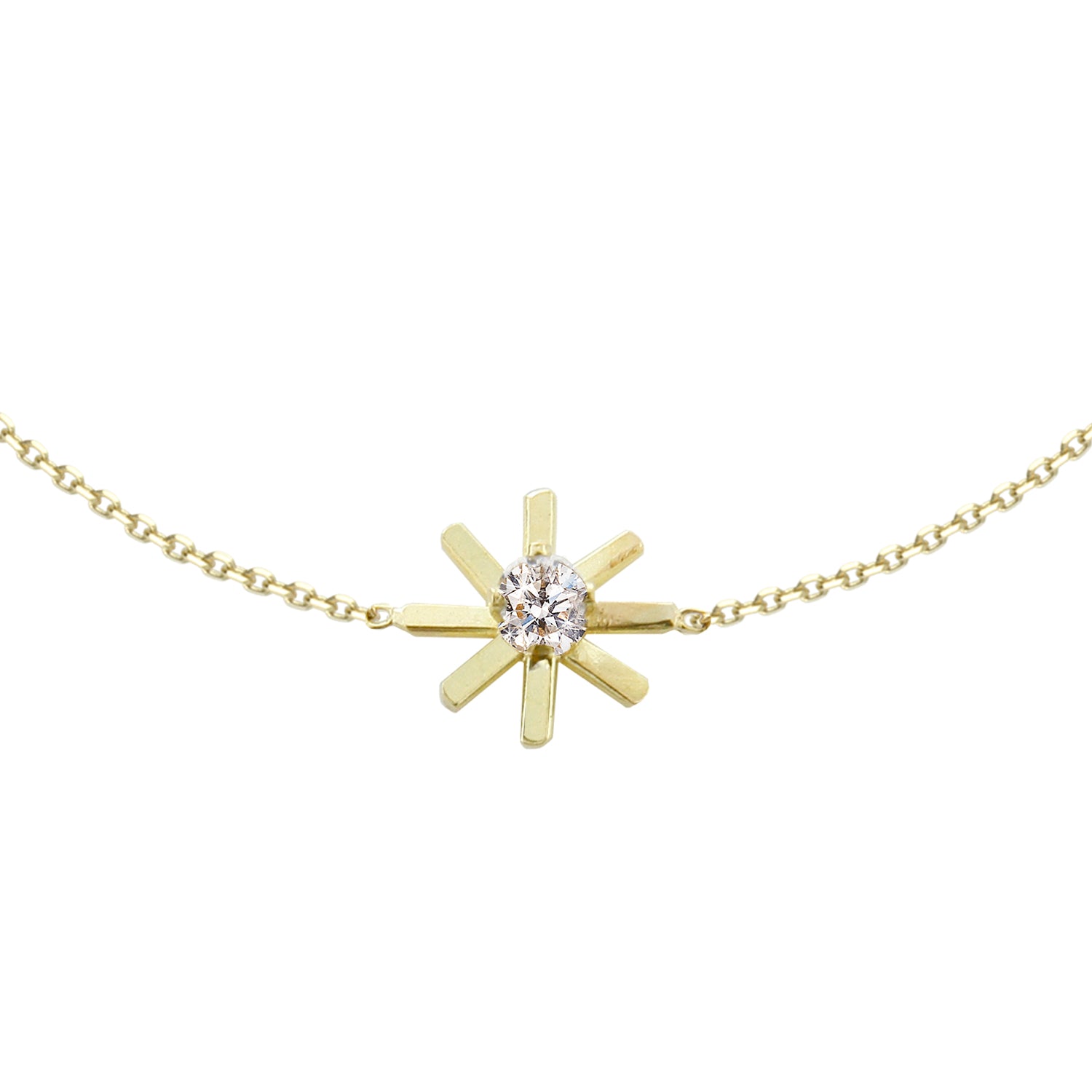 This 18ct yellow gold fine chain bracelet is from our Pop Up Daisy Collection. The Flower motif is made up from fine gold petals and features a central Diamond set collet