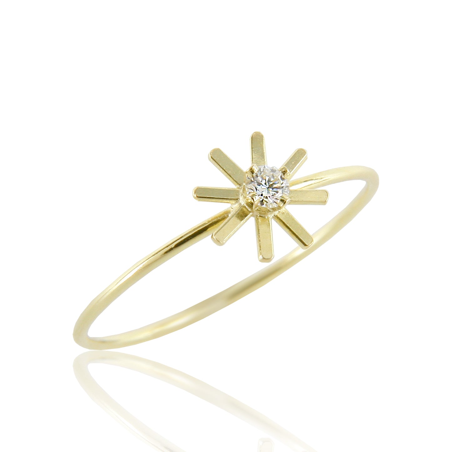 This 18ct yellow gold fine diamond ring is from our Pop Up Daisy Collection. The Flower motif is made up from fine gold petals and features a central Diamond set collet.