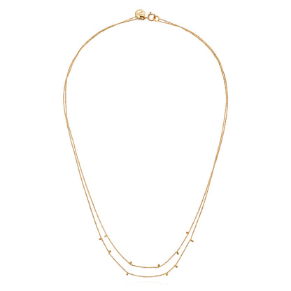 This cute 18 ct yellow double strand necklace is made of fine chain sprinkled with a shimmering of gold embellishments and is part of our Gold Dust Collection.  