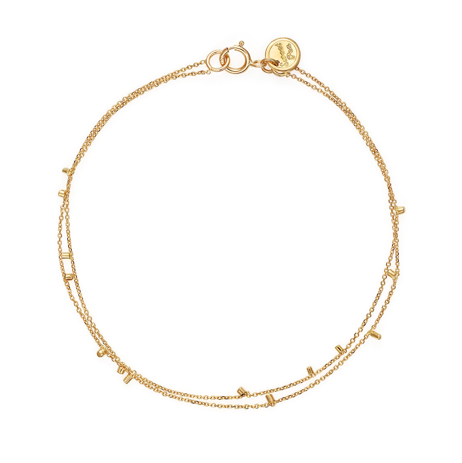 This cute 18ct yellow double strand bracelet is made of fine chain sprinkled with a shimmering of gold embellishments and is part of our Gold Dust Collection.
