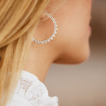 Agnes De Verneuil Silver Hoop earrings on model