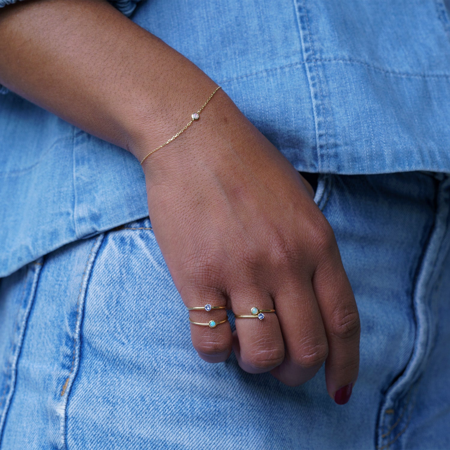 Opal gold chain bracelet on model