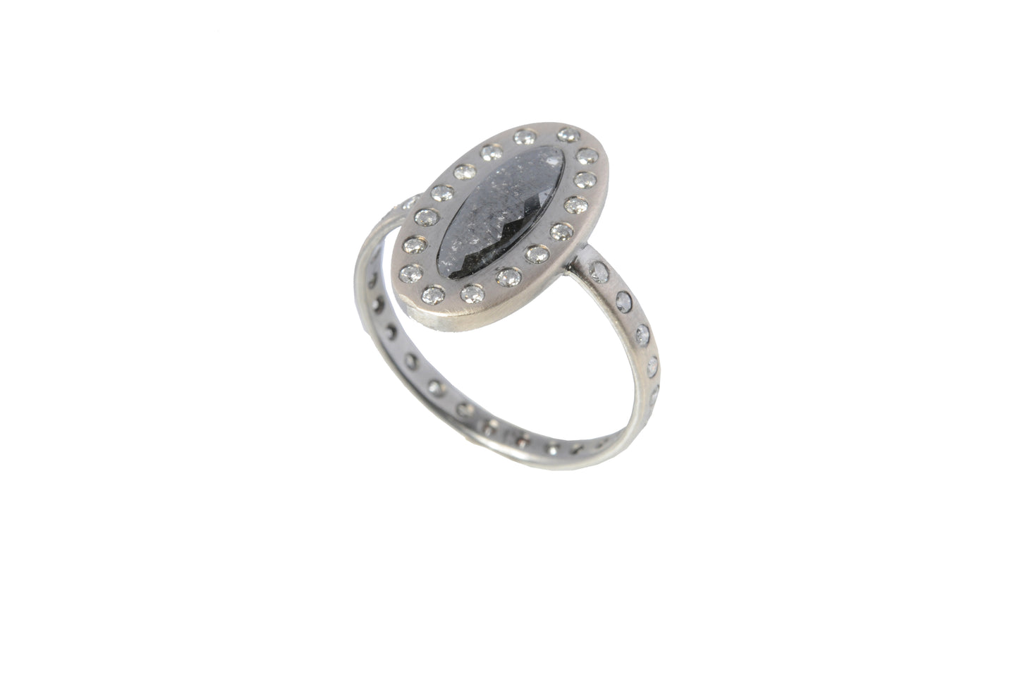 Sweet Pea 18ct white gold black diamond slice ring with salt and pepper diamond surround and set band. Black diamond engagement ring.