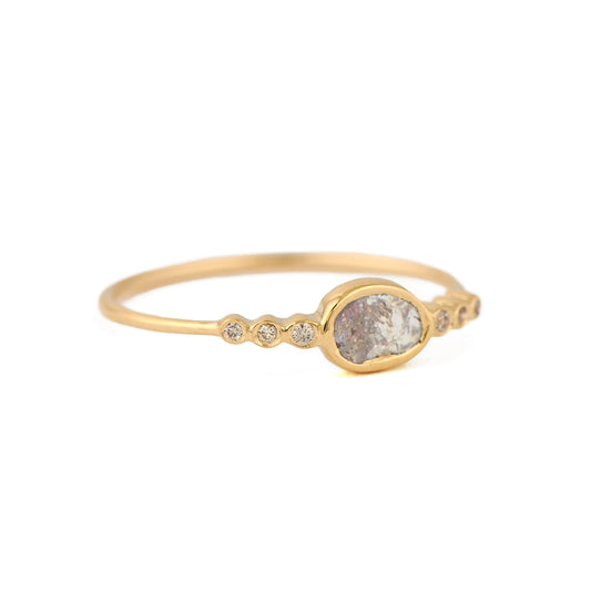 Celine Daoust 14k light yellow gold ring with one central light grey diamond and six brilliant cut diamonds.