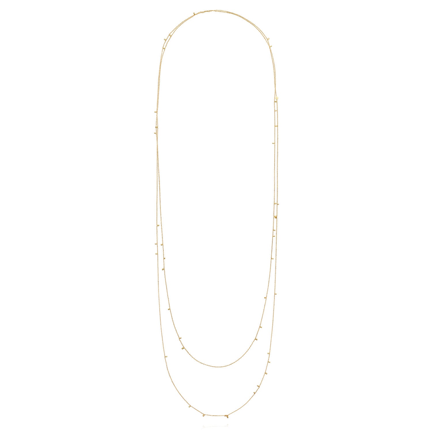 This fabulous long 18ct yellow necklace made of fine chain sprinkled with a shimmering of gold embellishments is part of our Gold Dust Collection
