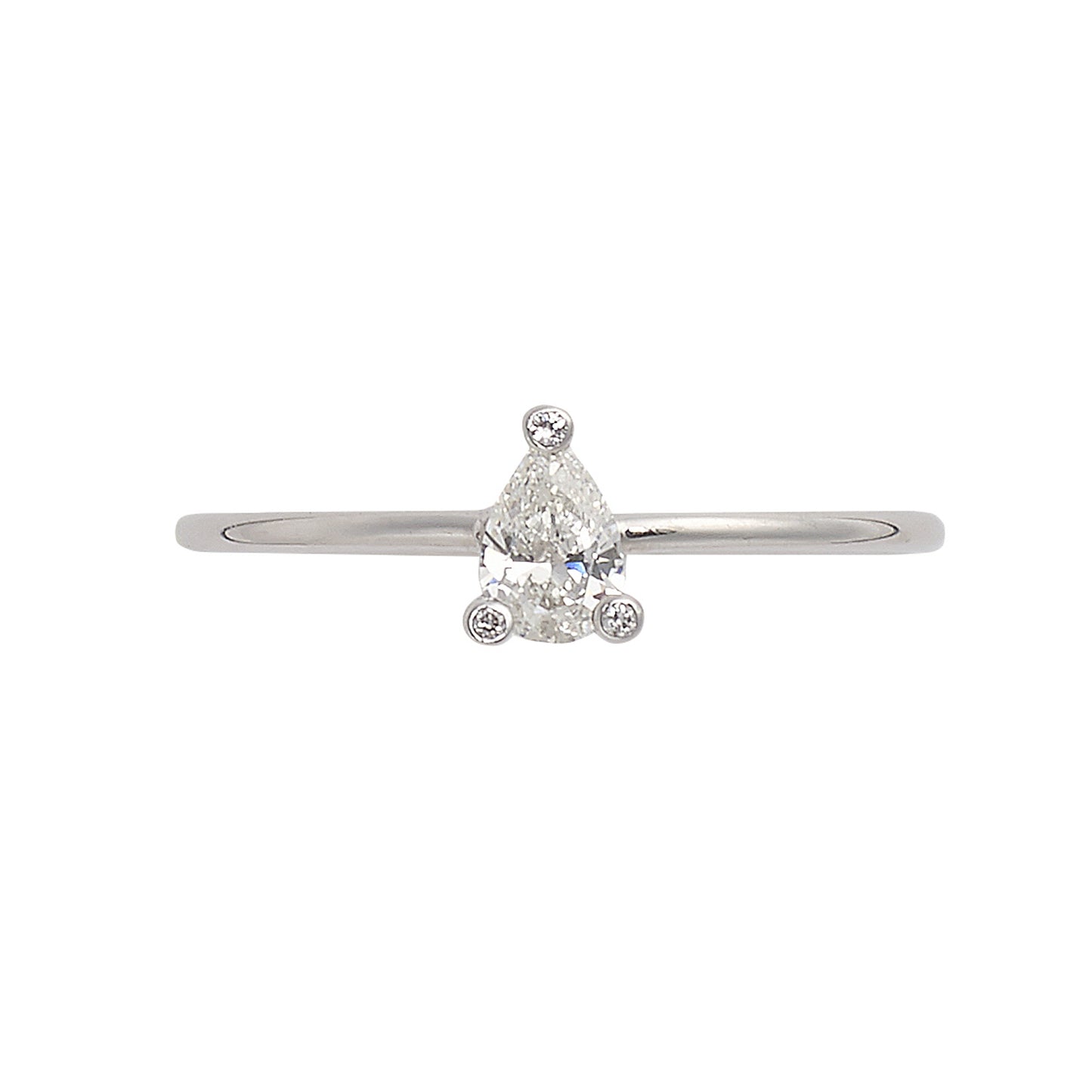 Sweet Pea 18ct white gold engagement ring with claw set pear shaped white diamond and diamond set tips.