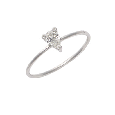 Sweet Pea 18ct white gold engagement ring with claw set pear shaped white diamond and diamond set tips.