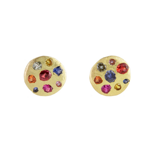 Polly Wales 18ct yellow gold  crystal earrings are disc studs set with rainbow sapphires. Organic rainbow stud earrings.