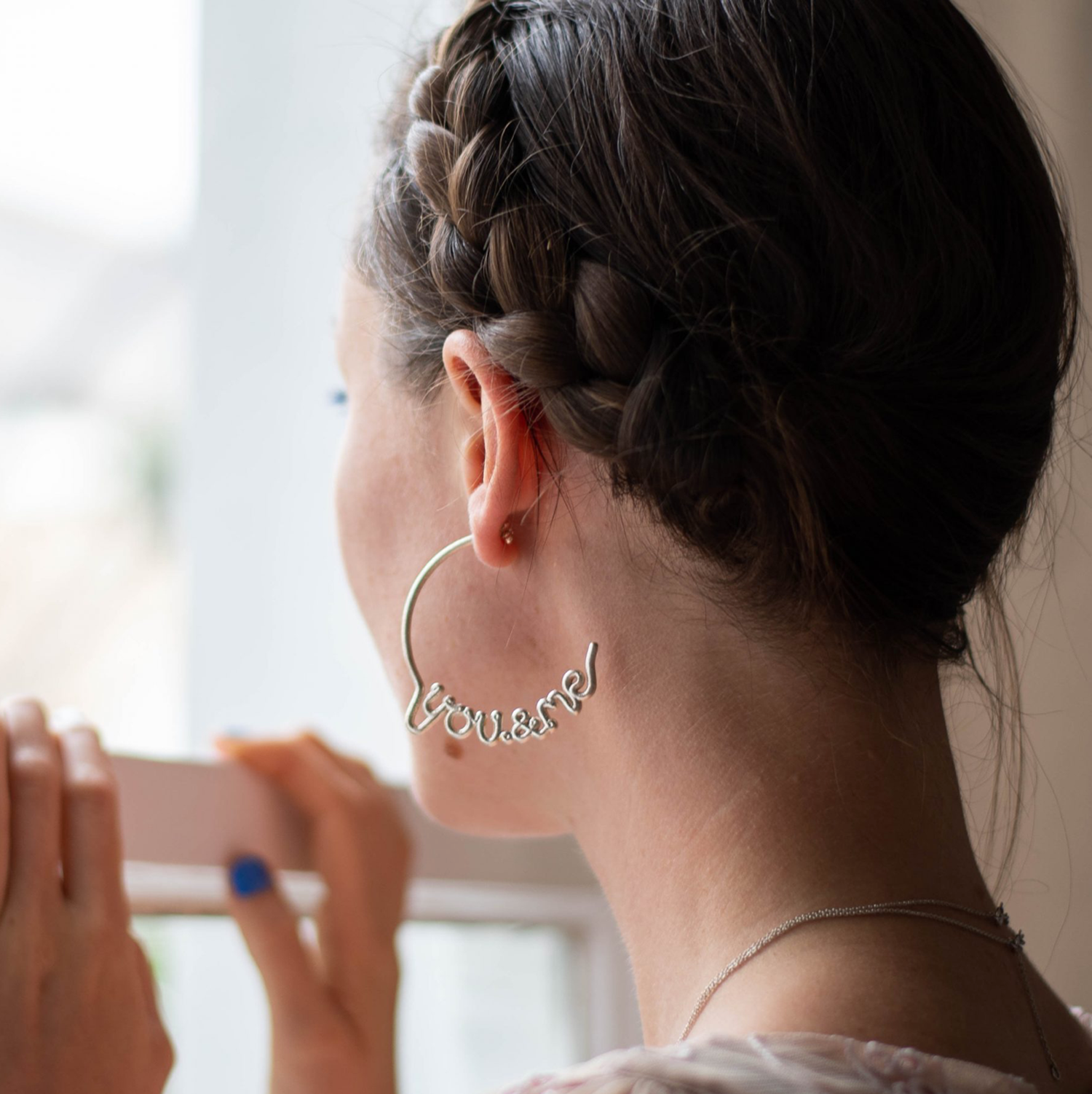 Zoe Sherwood 'You & Me' hoop earrings seen on model.