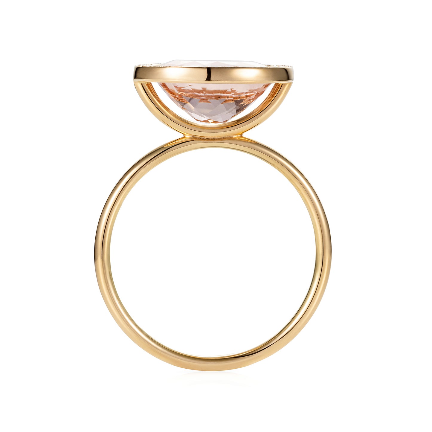 Sweet Pea 18ct yellow gold cocktail engagement ring with large, raised peach oval sapphire with a pave set diamond surround.  Edit alt text