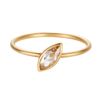 This 18ct yellow gold marquise champagne diamond ring is truly unique. The 0.34ct diamond is set with a fine bezel and sits at an angle on top of a 1.2mm, round, matt band. ENGAGEMENT RING, ALTERNATIVE ENGAGEMENT RING
