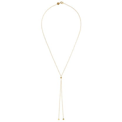 18ct yellow gold necklace with diamond pave set square pendant, through which a threaded golden tail sits with hanging square gold ends. The collection was inspired by favourite family games and the serendipitous charm of the dice.