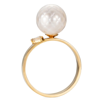 Side view of Sweet Pea 18ct yellow gold polished band ring with white faceted pearl and 2 diamond baguettes